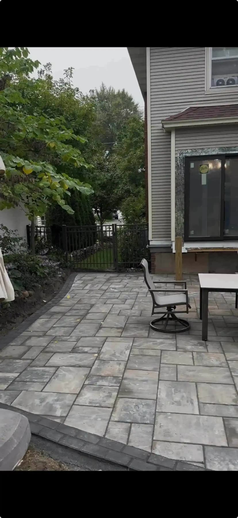 Custom paver patio with seating area Grand Rapids MI
